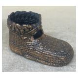 Sue wheelers first baby shoe in bronze