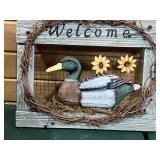 Wooden welcome duck sign