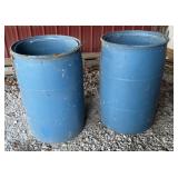 Two blue 55 gallon plastic drums