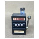 Miniature battery operated slot machine