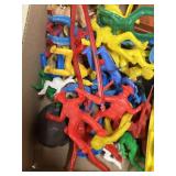 Cowboys and wagons and a boat plastic