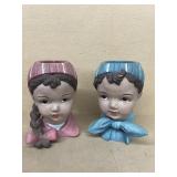 Little boy and little girl planters