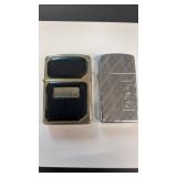 2 monogram ZIPPO lighters