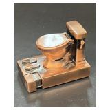 Toilet novelty, cigarette lighter