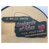 Orchard of Eden 2 miles away wooden sign