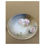 German hand-painted rose bowl does have chip on