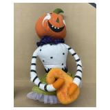 Hand-painted sitting Halloween pumpkin