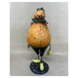 Pumpkin holding leaf Halloween fall decoration