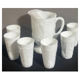 Milk, glass water, pitcher, and glasses
