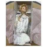 Camelot porcelain doll