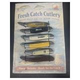 Catch cutlery, knife collection on display card