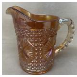 Carnival glass pitcher