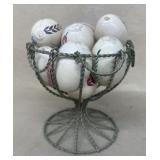 Antique wire basket with wooden eggs