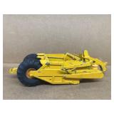 Caterpillar scraper