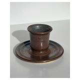 Studio pottery cup on plate