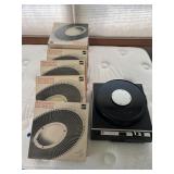Slide projector and extra slide reels