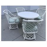Wicker table and chairs (Kept inside)