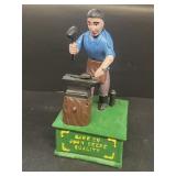 Bank of John Deere blacksmith cast iron bank