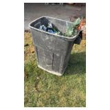 Trashcan with floral contents