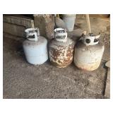 (3) empty propane tanks
