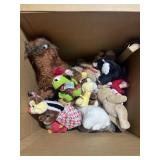 Box of stuffed plush animals