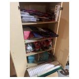 Christmas wrapping paper, contents of cabinet
