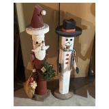 Wooden sand and snowman