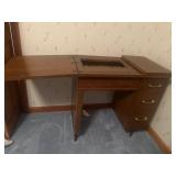 Sewing machine cabinet