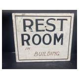Restroom in building wooden sign