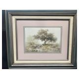 Framed print of deer drinking stream