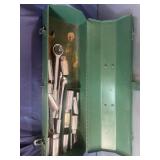 Green toolbox with wrenches