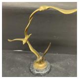Brass bird sculpture