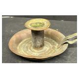 Early brass candle holder