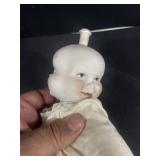 Rare porcelain three headed doll