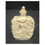 Early carved bottle