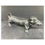 Cast-iron wiener dog boot scrape