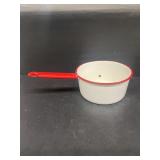 Enamel white and red sauce pan