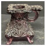 Early purple glass candle holder