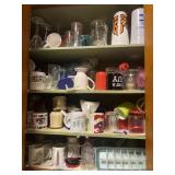 Coffee cups contents of cabinet