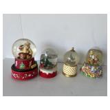 Musical and other snow globes