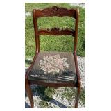 Vintage chair with flower design padding