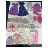 Barbie doll style clothing assortment