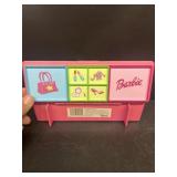 Barbie's accessory case with items