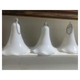 Three milk glass bell type shades