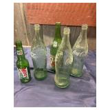 Large Coke and 7-Up bottles