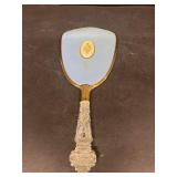 Antique glass handled vanity mirror