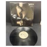 White snake slide it in Record album Record is i