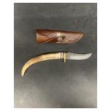 Bone handled Damascus, steel knife