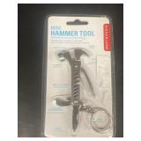 A mini hammer tool pocket keychain