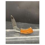 Gun handle style pocket knife